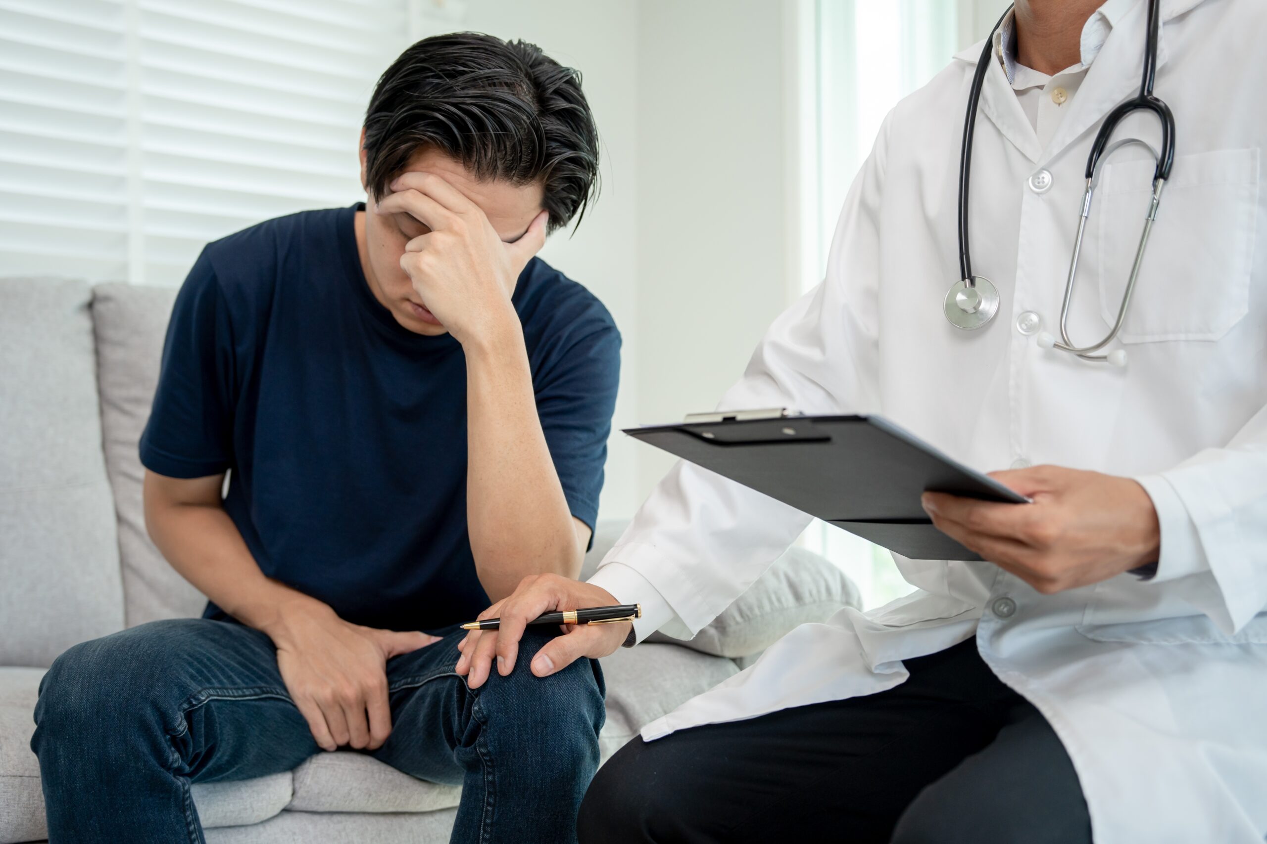 stressed patient with doctor