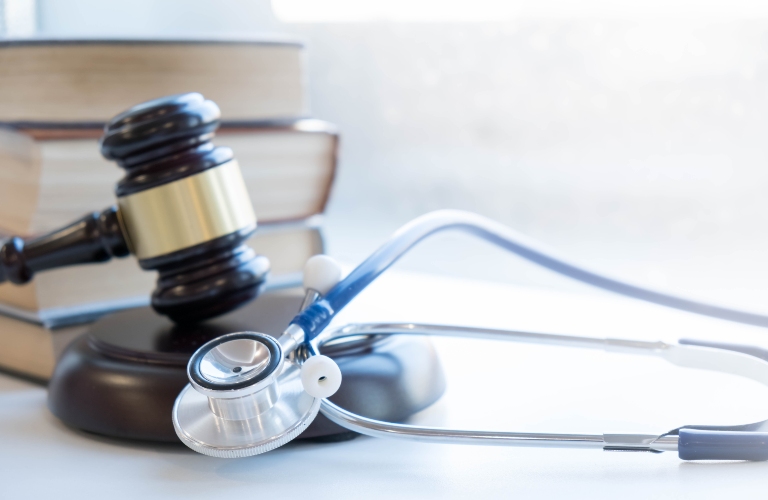 Judge's gavel and stethoscope
