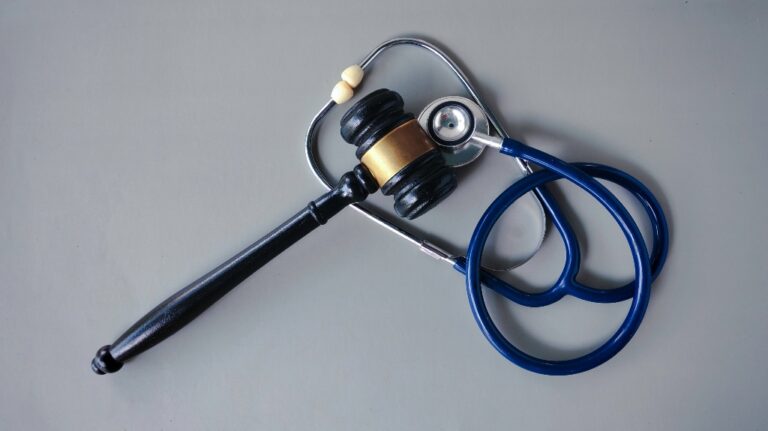 judge's gavel and stethoscope